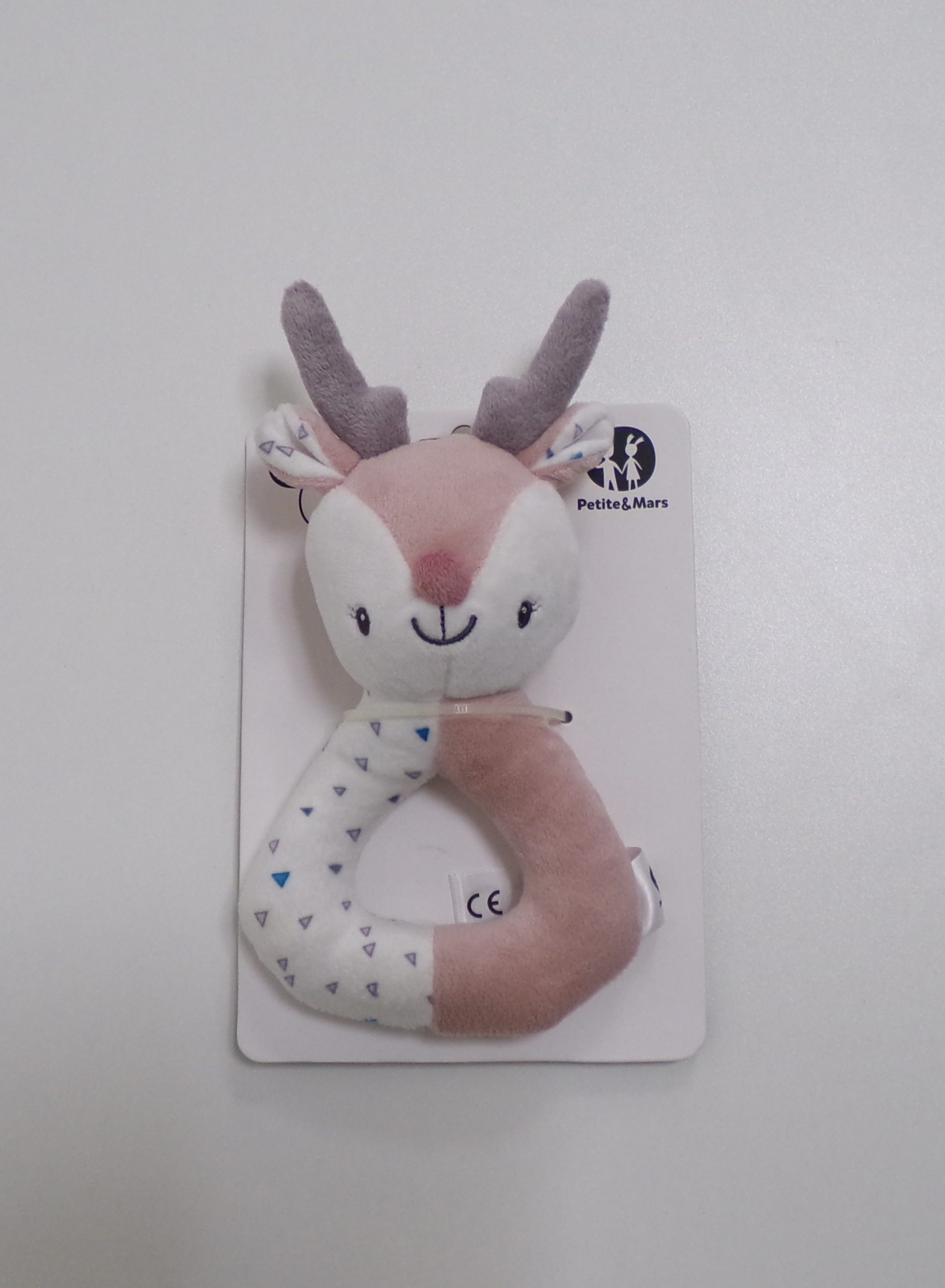 PETITE&MARS Hračka chrastítko do ruky Suzi